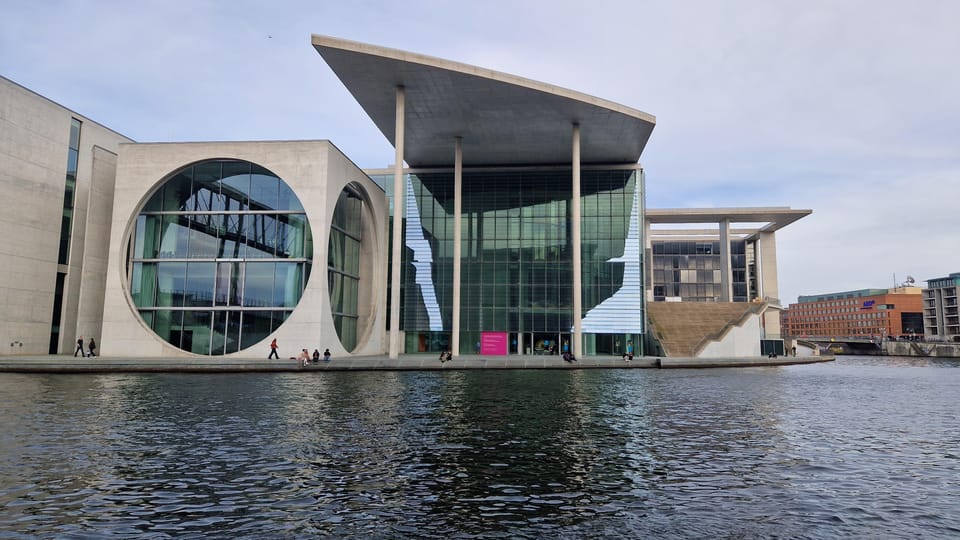 Berlin: Guided Walking Tour around the Reichstag - German Chancellery and Swiss Embassy: power you can spot from the sidewalk