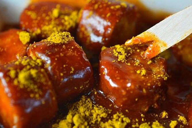 Food tasting tour in Berlin of HIDDEN GEMS (Small Groups) - Stop 4: Torstraße 122 currywurst and a classic drink pairing