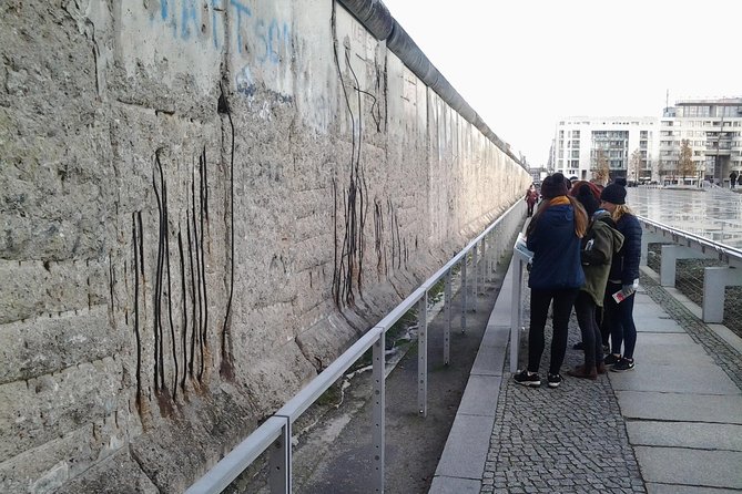 Group Walking Tour (1 - 20 people): 3 Hours the Wall, Third Reich, WW2, Cold War - Brandenburg Gate: a national symbol with a dark rewind button