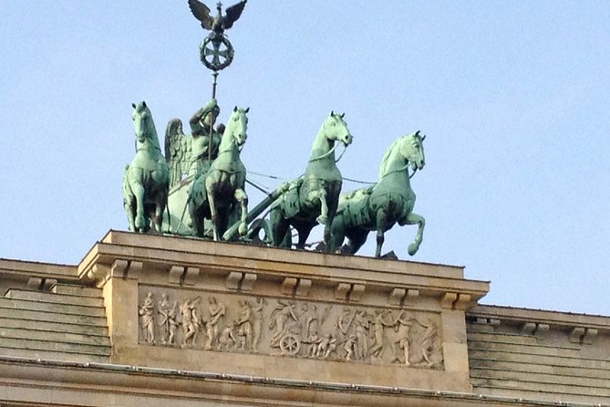 Private Taxi Tour of Berlin East and West and Neighbourhood approx. 4-6h - East Berlin power and reunification symbolism: Reichstag to Brandenburg Gate