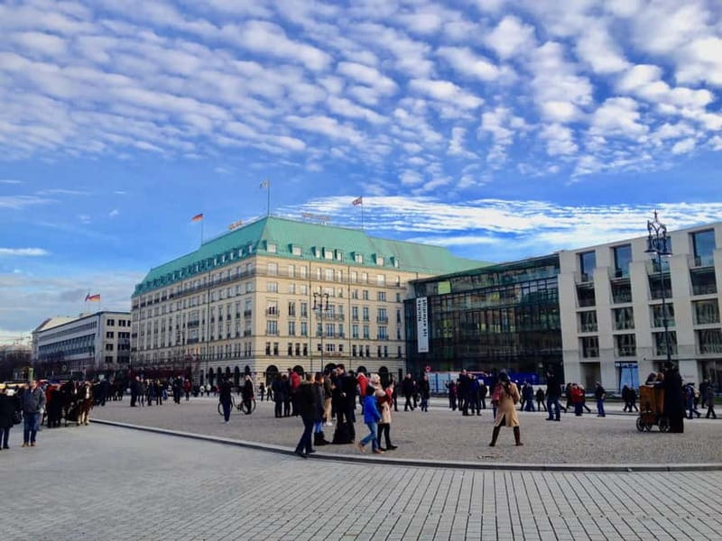 Private Taxi Tour through Berlin East and West and Kiez 4-6h - Living in the In-between: Friedrichstraße and the Center of Power